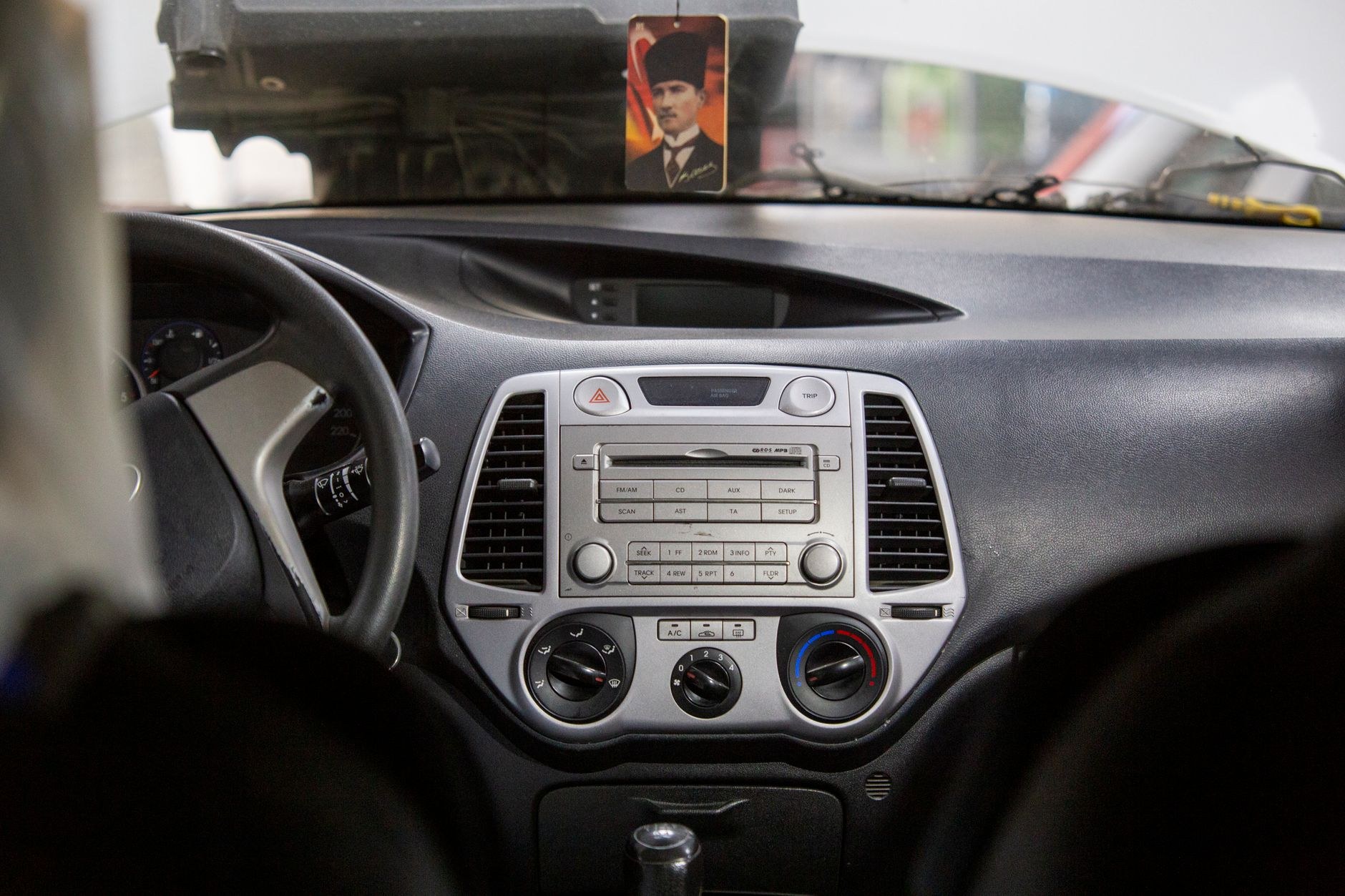 Car interior dashboard with the factory stereo